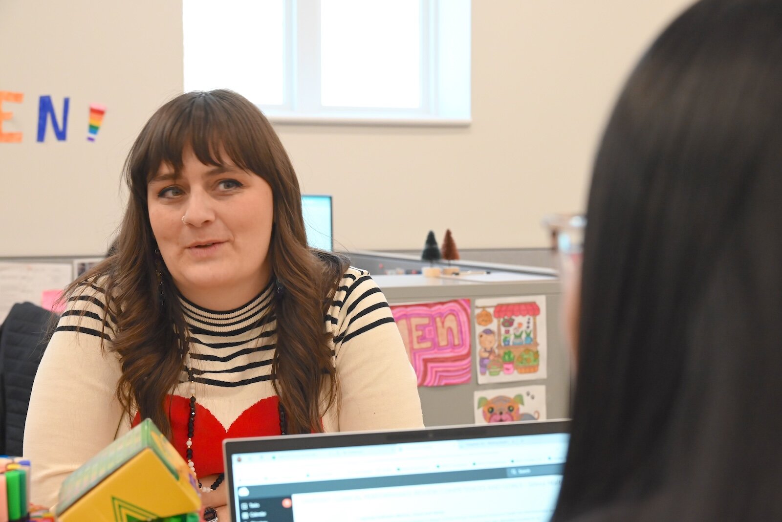 Alison Schuyler, OnPoint Access Program supervisor, left, talks with Selena Walters, access coordinator.