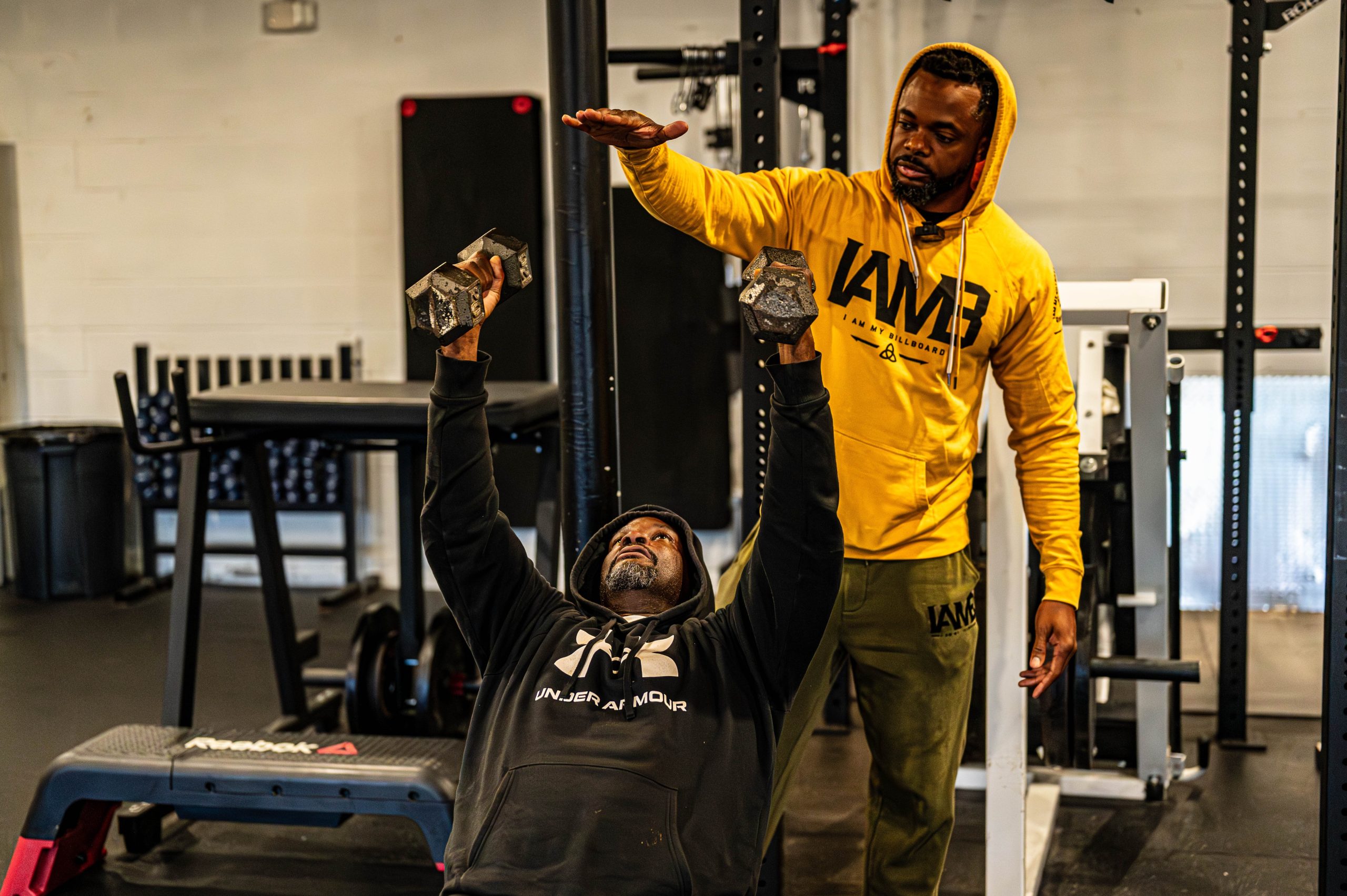 Ed Wilson trains a client at I Am My Billboard. (Ray Gray | Flintside.com)