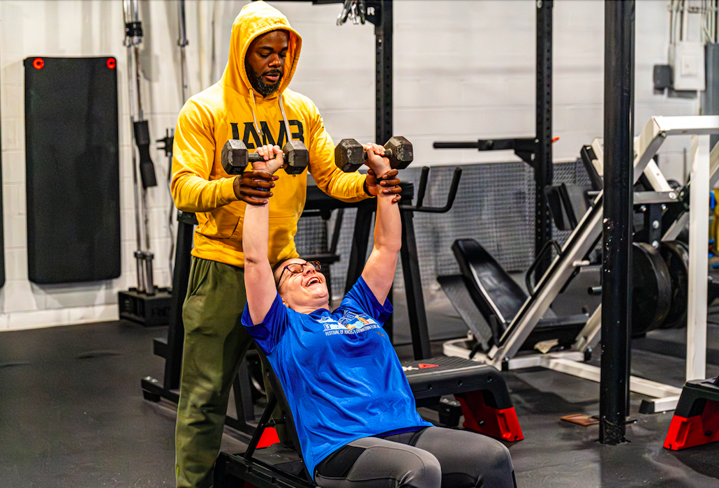 Ed Wilson trains a client at I Am My Billboard. (Ray Gray | Flintside.com)