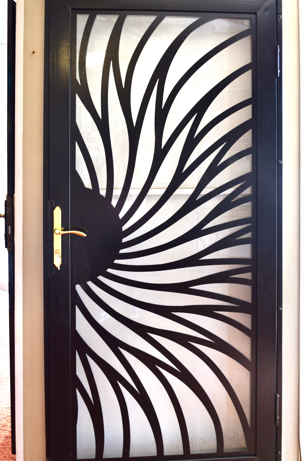 Ornamental Security Doors offers arm dorms and window bars to help Flint residents feel safer in their homes. (Michell Thompson | Flintside.com)