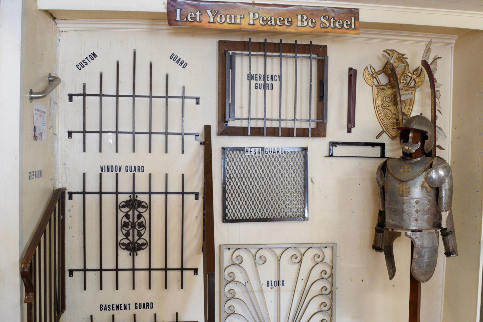 "Let Your Peace Be Steel," is displayed on a sign at Ornamental Security Doors in Flint. (Michell Thompson | Flintside.com)