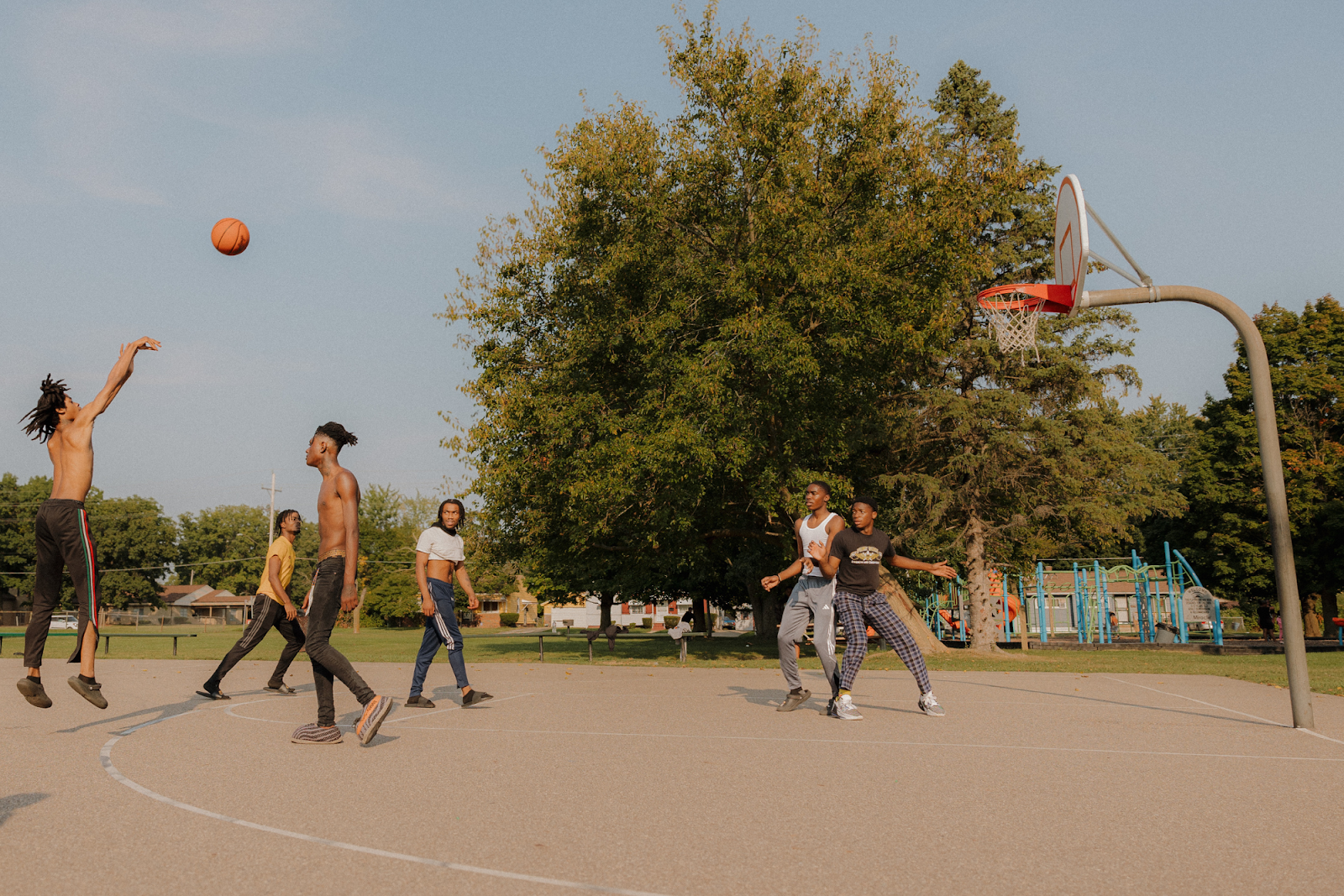 A young man takes a game-winning shot in a pickup basketball game, pictured Sept. 15, 2024. (Anthony Summers | Flintside.com)