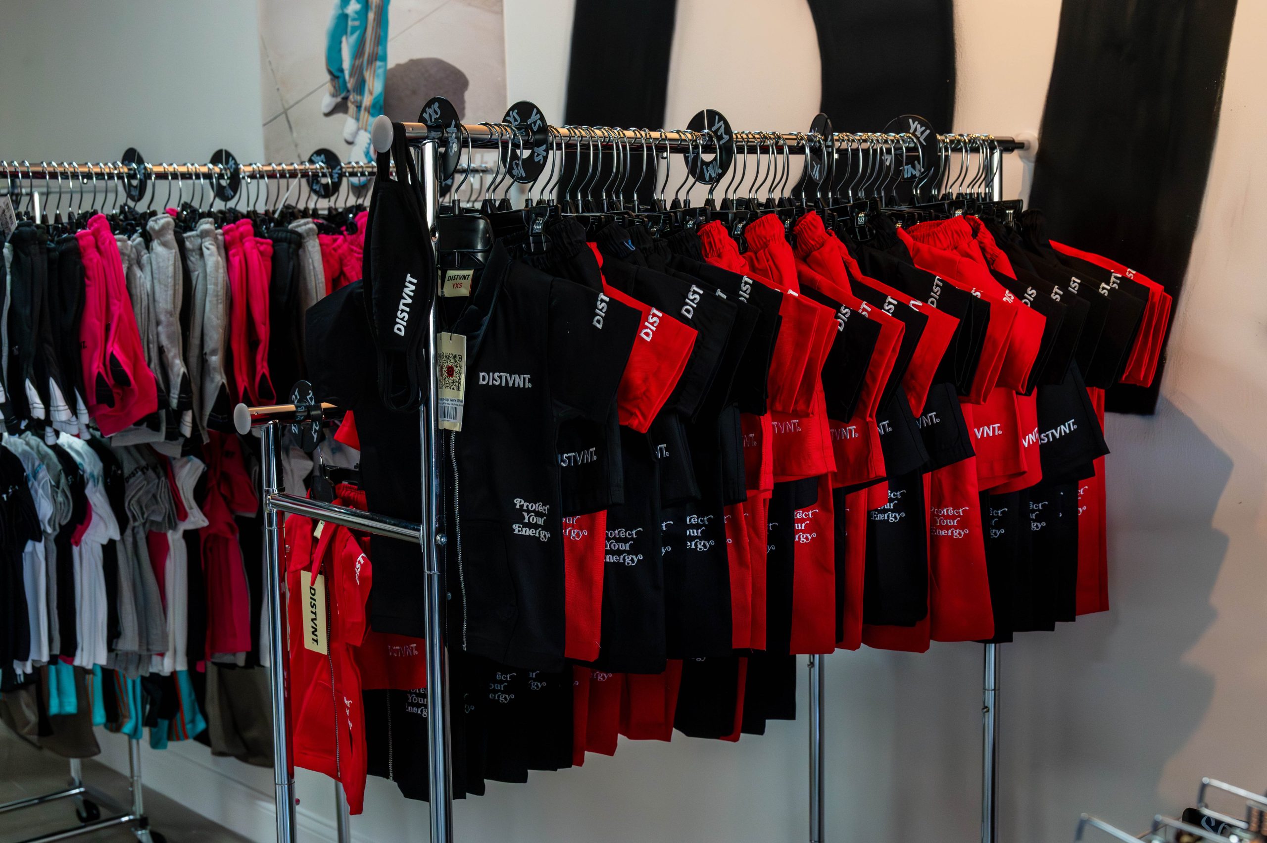 A rack of DISTVNT-brand shirts was on display during the grand opening of DISTVNT's storefront on Saturday, September 7, 2024. (Ray Gray | Flintside.com)