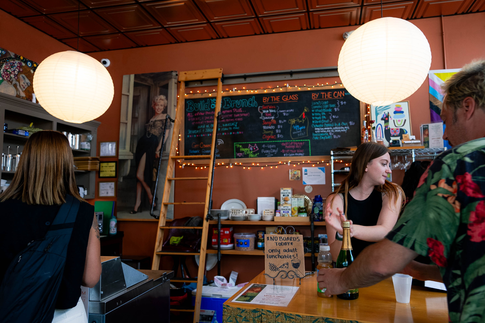 Queens' celebrated its first anniversary on Aug. 11, 2024, packed with patrons and stocked with wine and beer. (Travis Ricketts | Flintside.com)