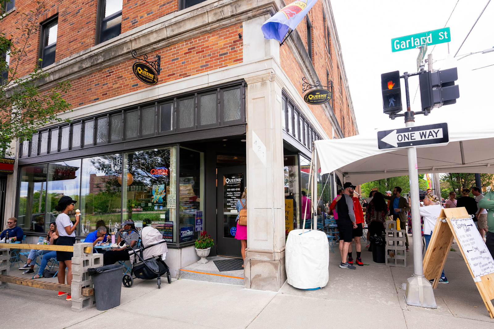 From the inside to outside, Queens' one-year-anniversary block party on Aug. 11, 2024, saw big crowds of supporters and community members. (Travis Ricketts | Flintside.com)