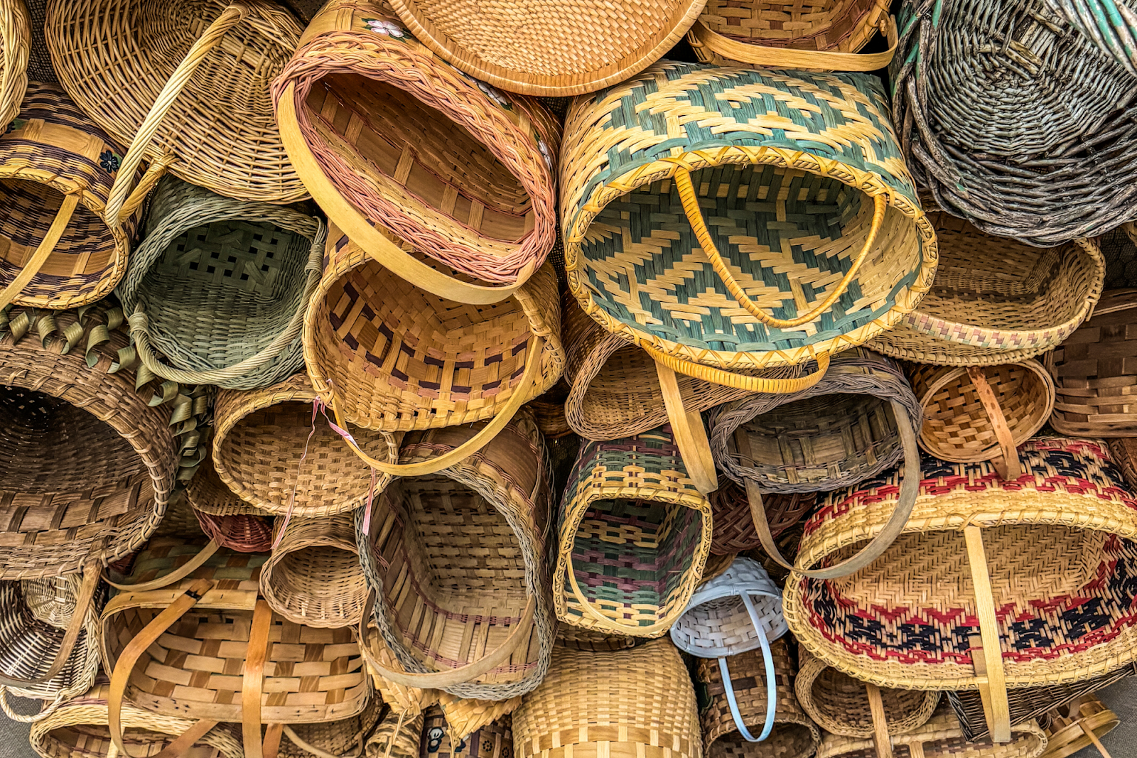 Pictured on July 13, 2024, baskets hang from the ceiling inside Hive Holistic Center's entryway, giving guests a unique view. (Xzavier Simon | Flintside.com)