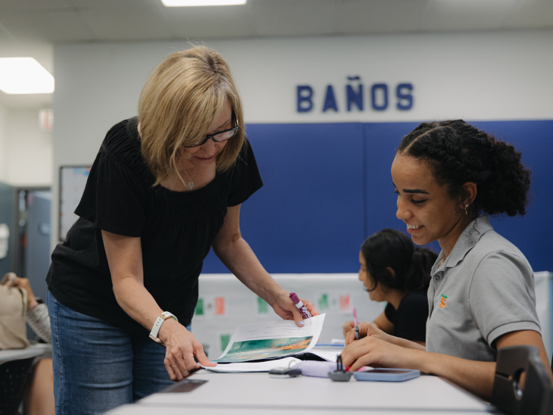 An instructor assists a student in one of the Latinx Technology & Community Center's many programs and classes, pictured on July 15, 2024.