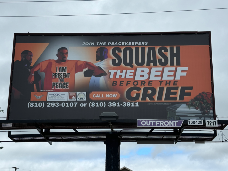 The Peacemakers' 'Squash the Beef Before the Grief' billboard stands tall on Flushing and Ballenger Hwy on May 31, 2024.