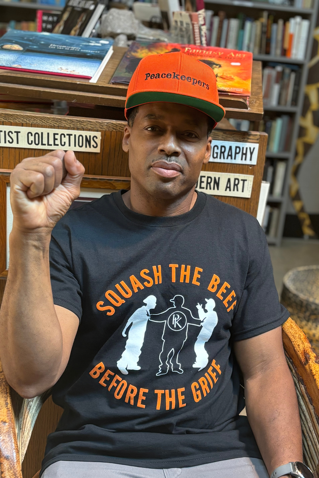 Spokesperson and Director of the Flint chapter of the Peacekeepers, Jalil X, poses with a raised fist on June 5, 2024.