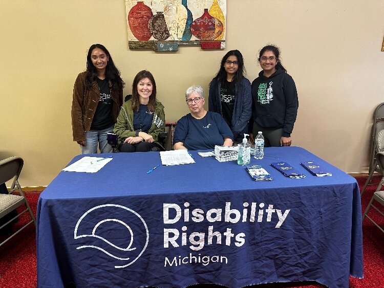 Members of Shielding Generations at a COVID-19 vaccination event with DRM vaccine advocates Kristen Milefchik and Tamela Phillips.