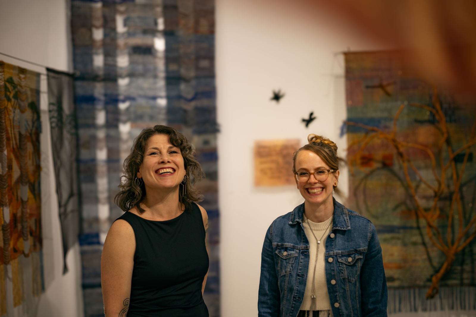 Pictured on April 18, 2024, Michele Leclaire and Buckham Gallery's Projects and Communications Coordinator, Katie Cotton, are a powerful dynamic duo that "balance each other" around their "crazy ideas." (Anthony Summers | Flintside.com)