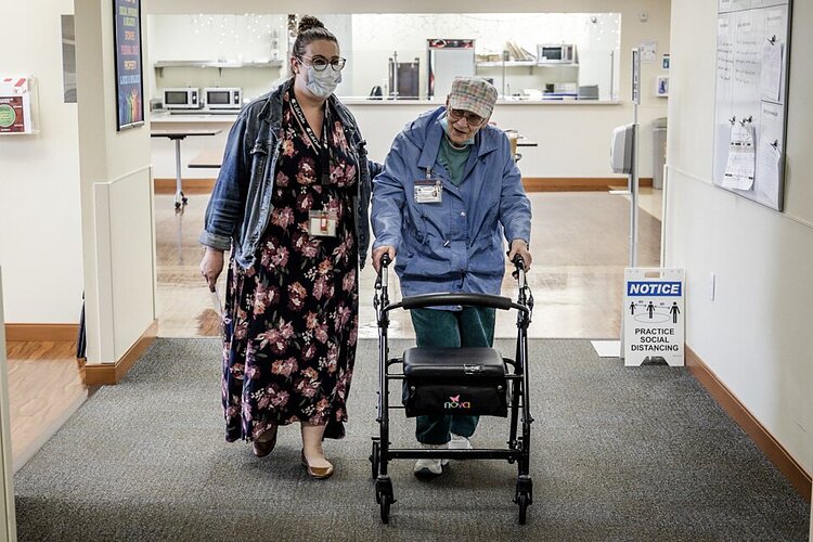 Sarah Milanowski accompanies a LifeCircles PACE participant.