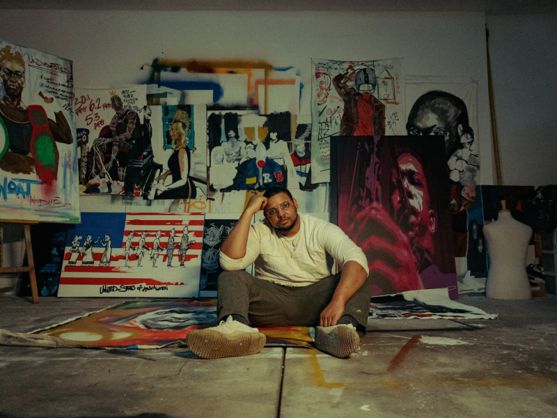 Flint native Keyon Lovett pictured inside his garage-turned-art studio on Jan. 29, 2024. (Anthony Summers | Flintside.com)