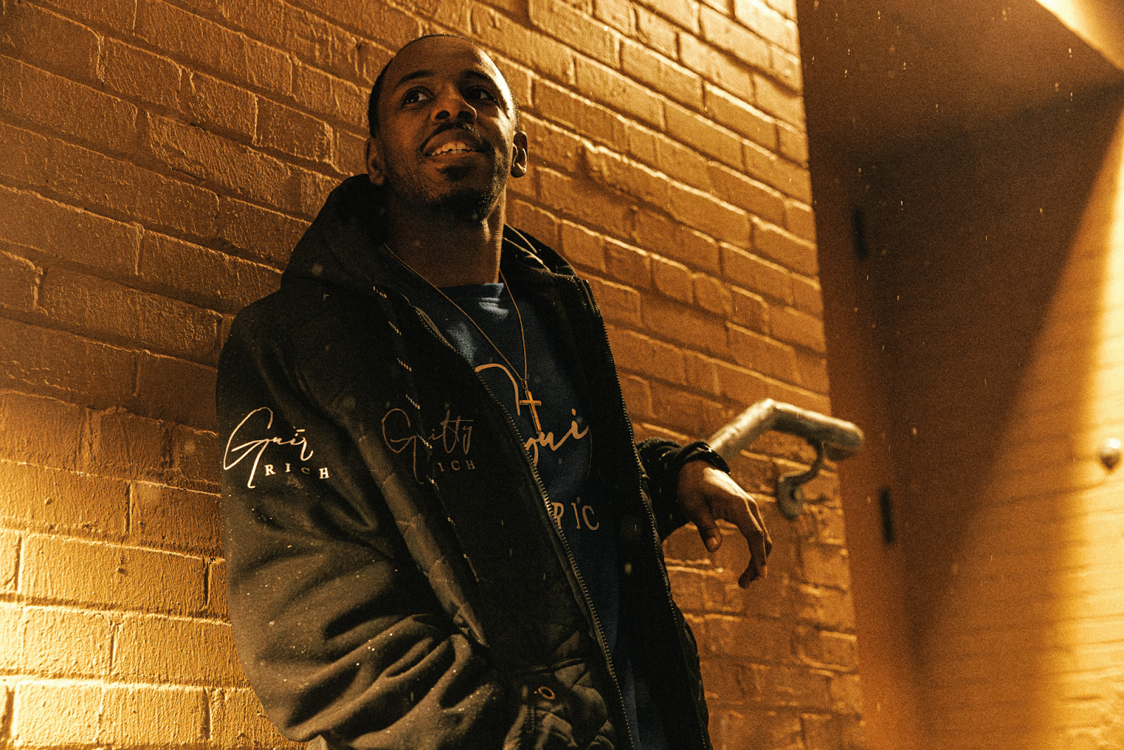 Houston talks about his journey with therapy after the passing of his mother and aunt in downtown Flint on Jan. 30, 2024. (Bryce Mata | Flintside.com)