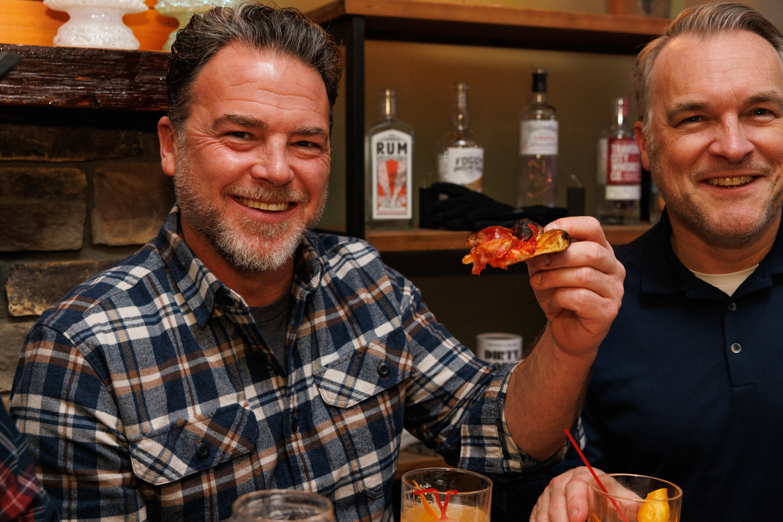 "At first, it was a business idea, but now it's a cultural idea. I want this as a legacy," explains Ijames as loyal customers, pictured on Jan. 18, 2024, support Bada Bing Pizzeria. (Bryce Mata | Flintside.com)