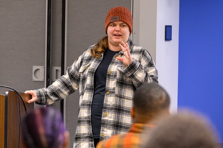 Janell O'Keefe, BCV technical assistant, shares information with Detroit residents.