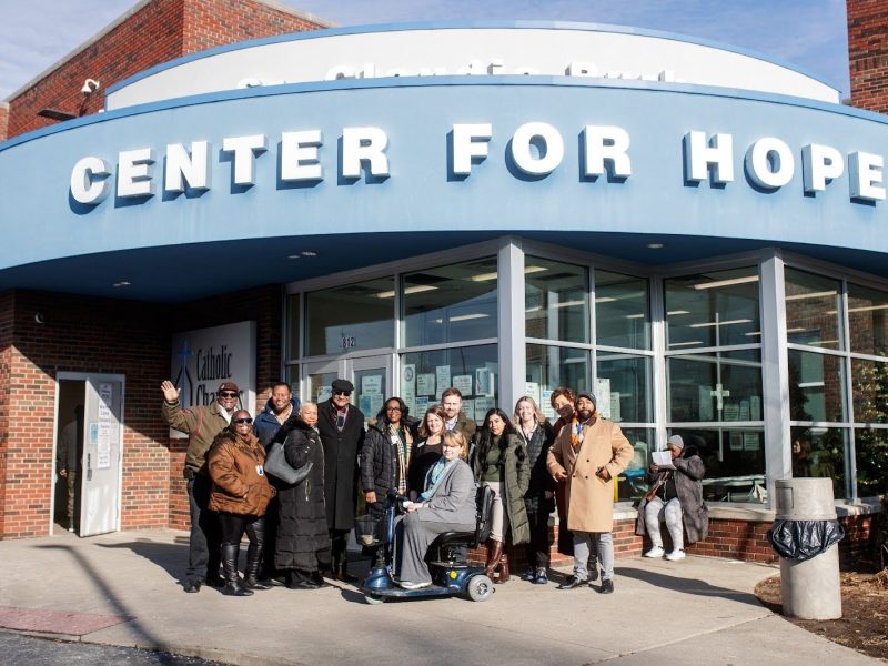 Hamilton Community Health Network and Center for Hope staff members pose for a group picture during the community-wide blanket donation delivery on Wednesday, Dec. 20, 2023.