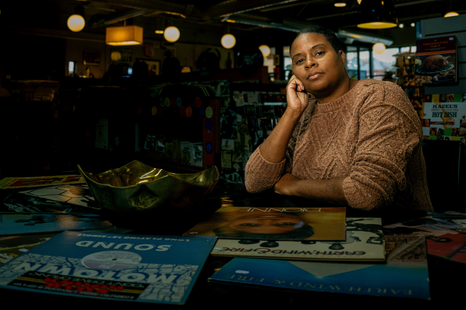 Billie Dantzler believes that "if nobody tells the story, nobody will know" inside Totem Books on November 20, 2023. (Anthony Summers | Flintside.com)