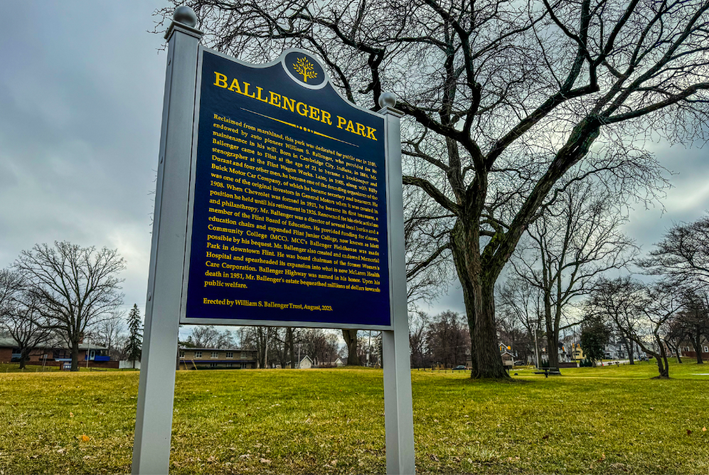 Pictured on Dec. 27, 2023, the Ballenger Park sign gives the history of William S. Ballenger Sr., after whom the park and Ballenger Highway are named. (Xzavier Simon | Flintside.com)