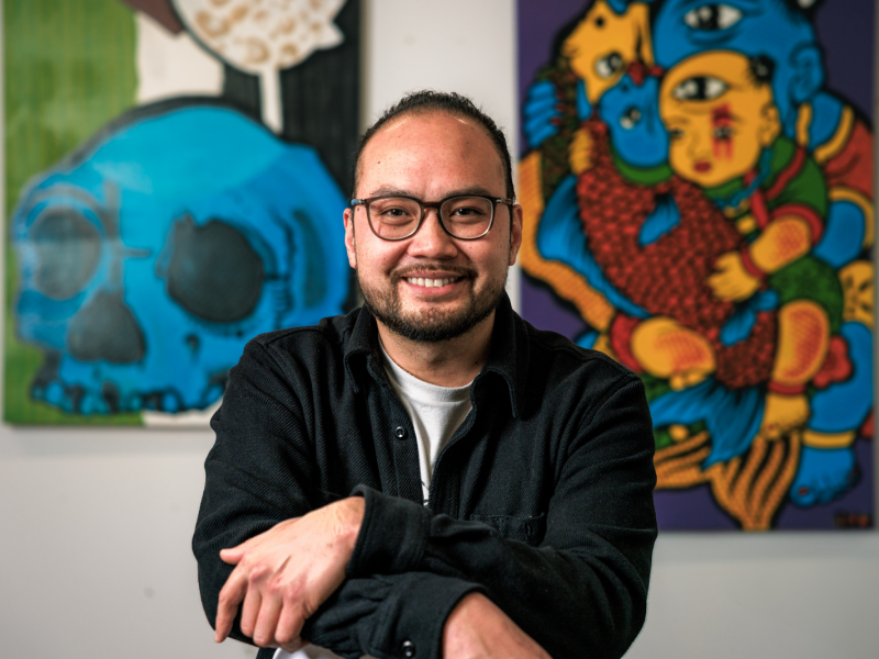 Tony Vu, Flint's food entrepreneur and the progenitor of The Flint Social Club, is all smiles inside the new pop-up, The Kickback, on Nov. 14, 2023.