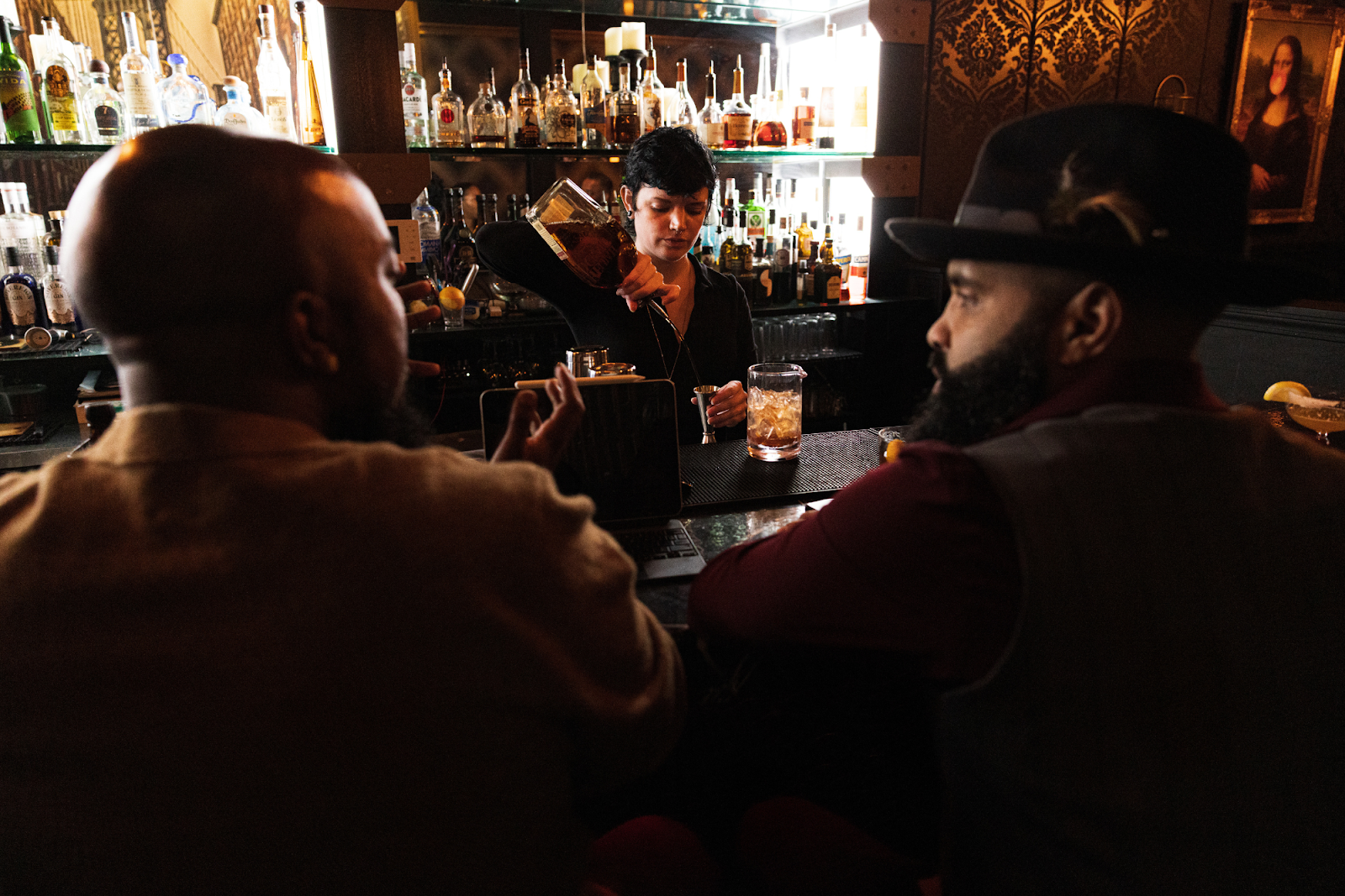 Raven prepares a bourbon old-fashioned cocktail on Oct. 25, 2023, one of the many spirits attendees will learn to create at The X's Nov. 2 Mixology 101 event. (Bryce Mata | Flintside.com)