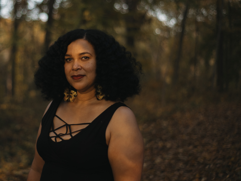 Flint native Sancia Tutt, known creatively and business-wise as Isis Ma’at, stands confident in her journey at For-Mar Nature Preserve on Tuesday, Oct. 24, 2023.