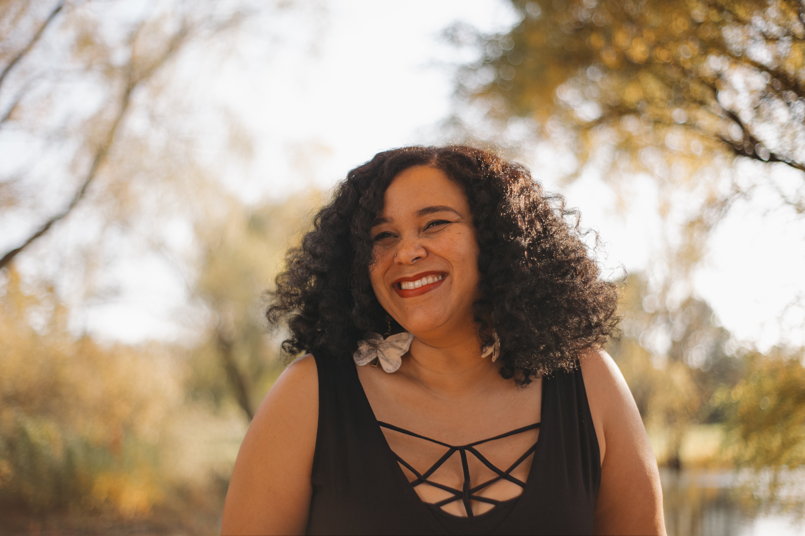 Isis Ma’at is all smiles when talking about her growth and business endeavors at For-Mar Nature Preserve on Oct. 24, 2023. (Anthony Summers | Flintside.com)