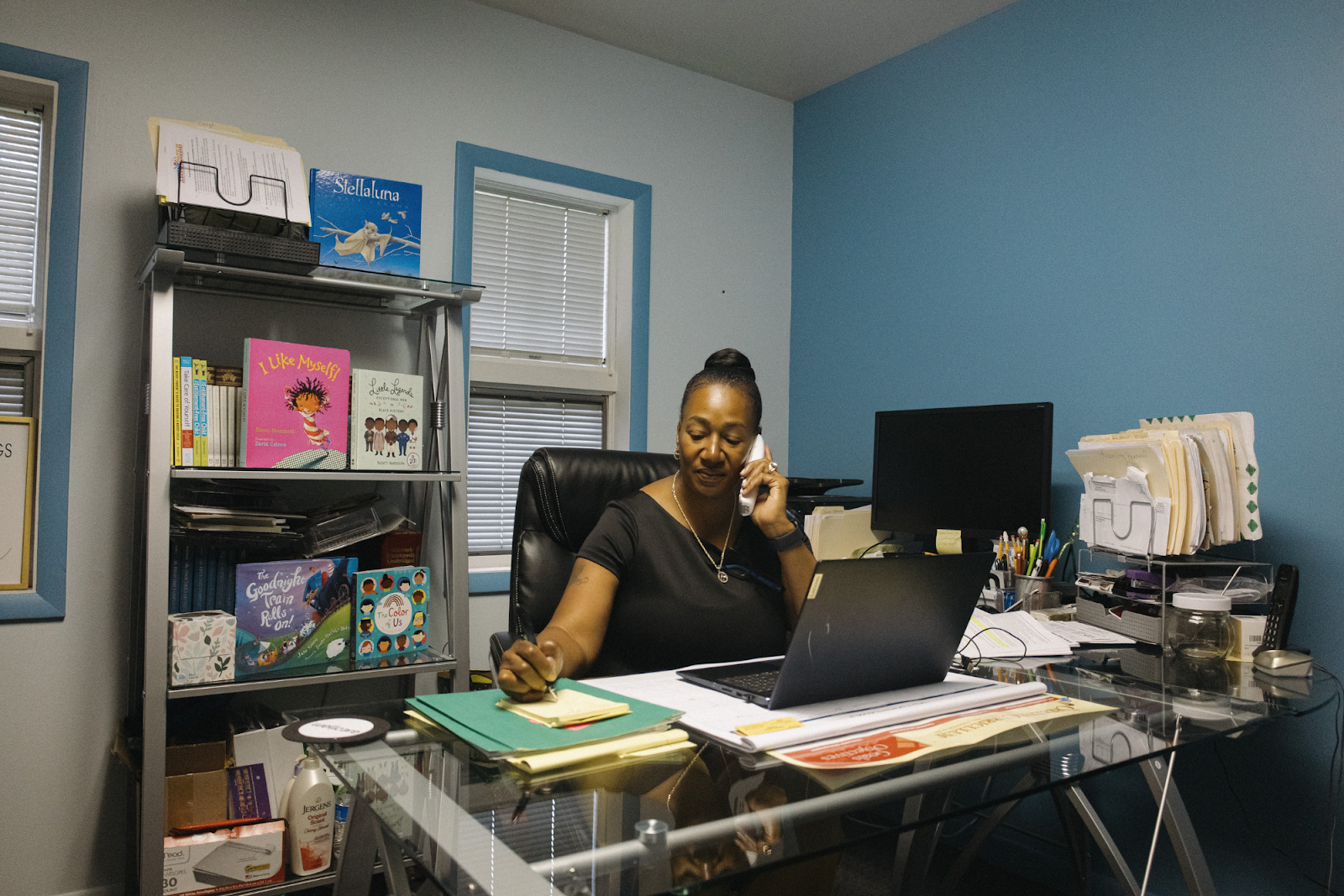 "Getting paid was awesome, but caring for the children was priceless," says Director Annette Hughes, pictured inside her office on Thursday, Oct. 5, 2023. (Anthony Summers | Flintside.com)