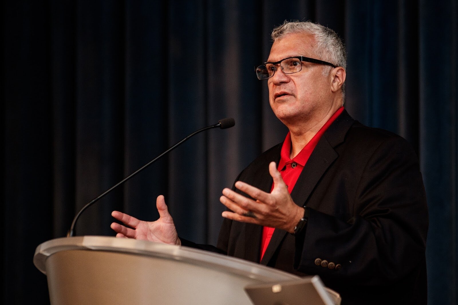 Art Reyes gives a speech during Mott Community College’s Technology Division’s Hispanic Heritage Month Celebration at the Regional Technology Center in Flint on Thursday, Sept. 28, 2023. (Jenifer Veloso | Flintside.com)