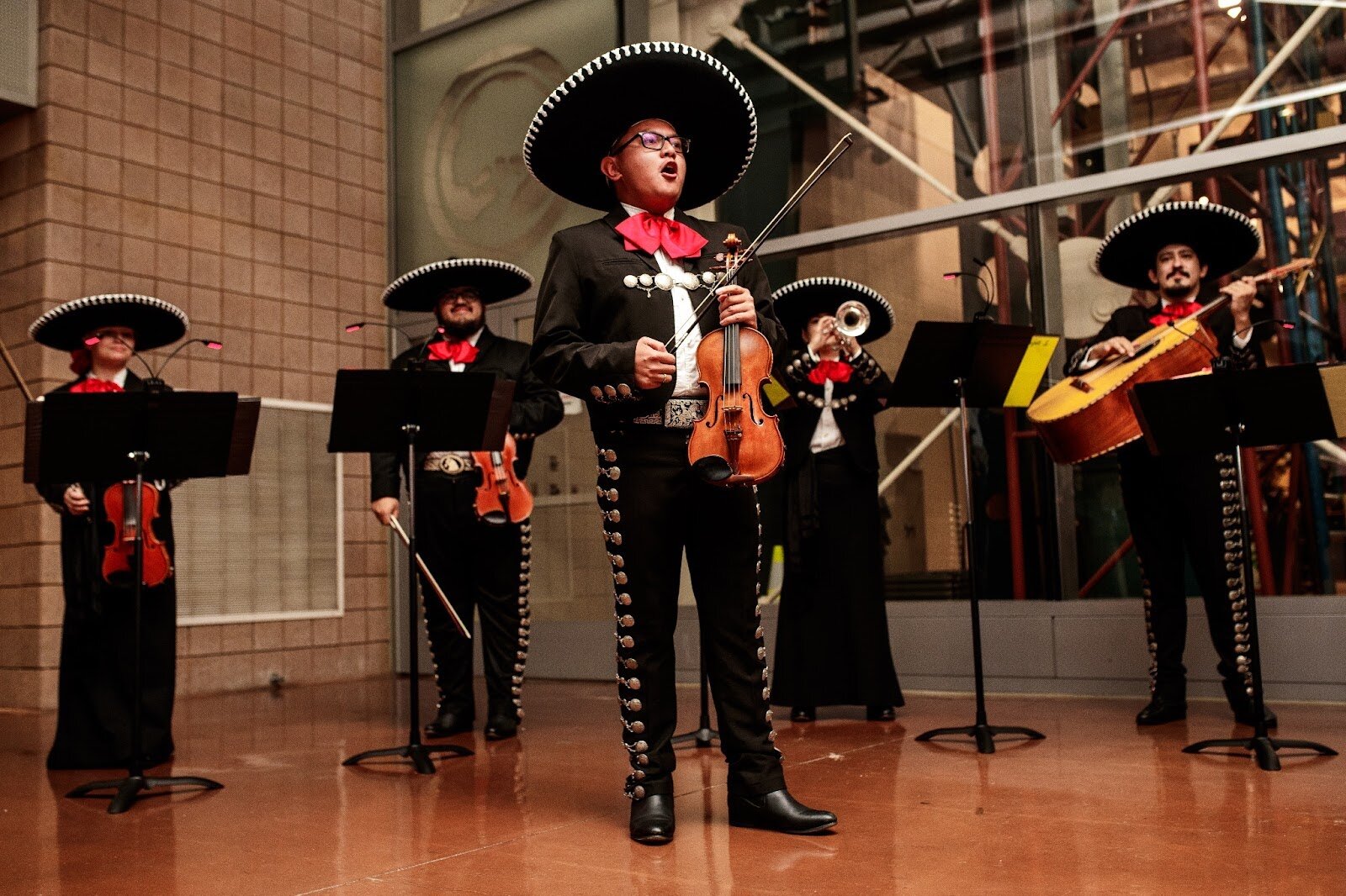 Gean Vincent Almendras performs with El Ballet Folklórico Estudiantil during Mott Community College’s Technology Division’s Hispanic Heritage Month Celebration at the Regional Technology Center in Flint on Thursday, Sept. 28, 2023. (Jenifer Veloso | Flintside.com)