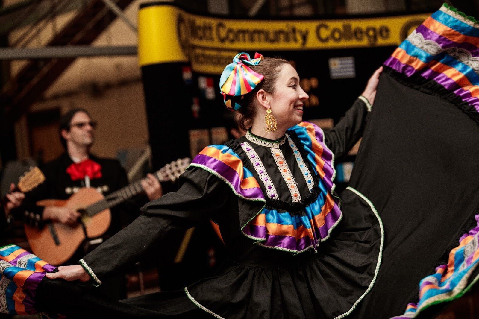 Hannah Nettleton with El Ballet Folklórico Estudiantil performs during Mott Community College’s Technology Division’s Hispanic Heritage Month Celebration at the Regional Technology Center in Flint on Thursday, Sept. 28, 2023. (Jenifer Veloso | Flintside.com)
