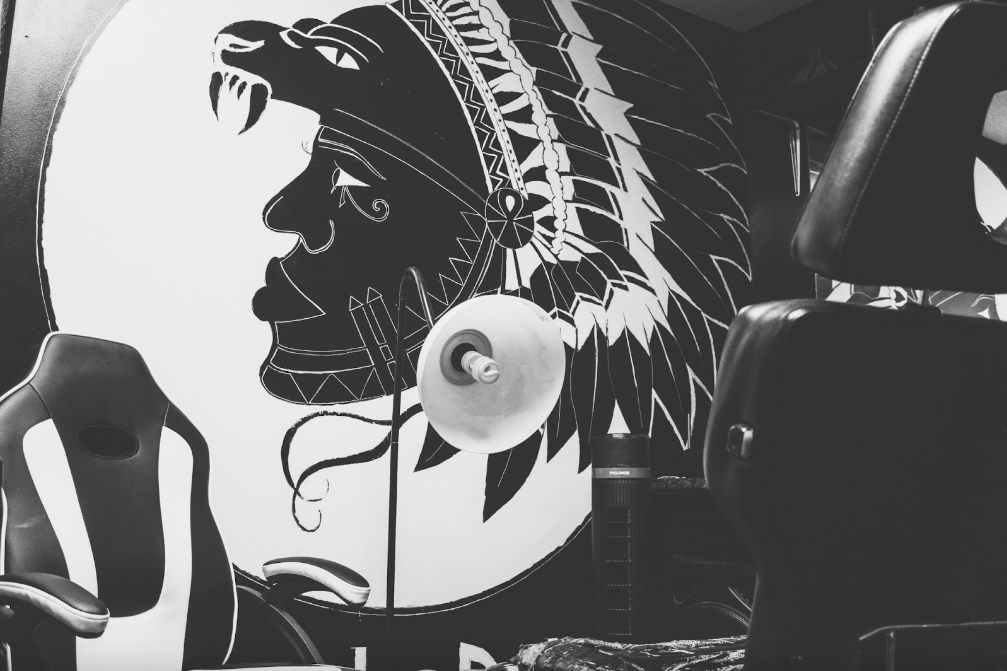 A hand-drawn mural by K-Dub of a Black Native American with the Eye of Horus in the tattoo room of K-Dub's Tattoo pictured on September 21, 2023. (Xzavier Simon | Flintside)