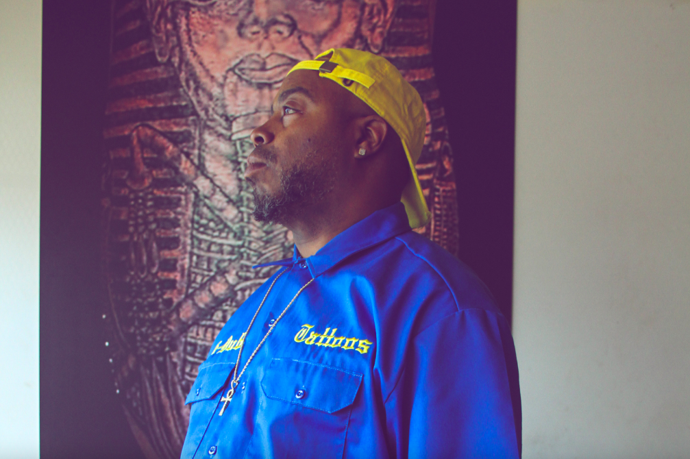 “[Drawing] is self-healing. Art, when you do it spiritually, it aligns you back to who you are — your purpose. It had to be my calling," explains K-Dub inside his tattoo shop on September 21, 2023. (Xzavier Simon | Flintside)