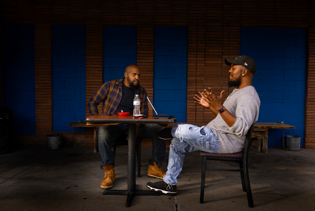 Roland seated outside his bar, recalling the heyday of Flint's vibrant LGBTQ+ community on September 20, 2023. (Anthony Summers | Flintside)