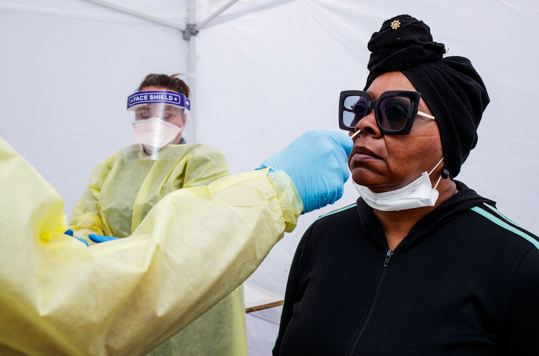 Glenda Lang receives a free COVID-19 swab test during the ‘Back to School Rally’ at Bethel United Methodist Church in Flint on Saturday, Sept. 9, 2023. (Jenifer Veloso | Flintside.com)