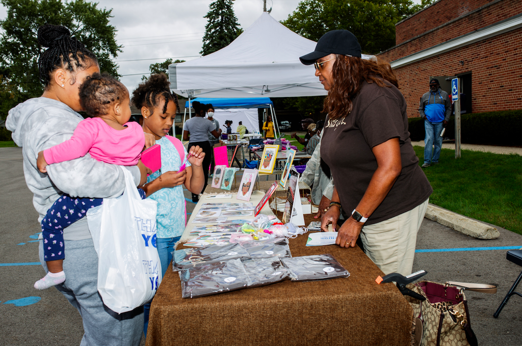 Rhonda Willingham, owner of Sista Girl greeting cards, runs a table with her personally made cards during the ‘Back to School Rally’ at Bethel United Methodist Church in Flint on Saturday, Sept. 9, 2023. (Jenifer Veloso | Flintside.com)