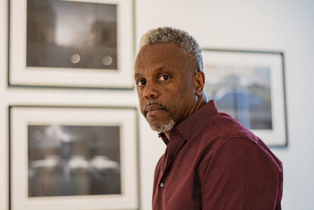Flint native, former journalist, author, and Buckham Gallery's 3rd Writer in Residence, Bob Campbell, inside the gallery in downtown Flint on July 29, 2023.