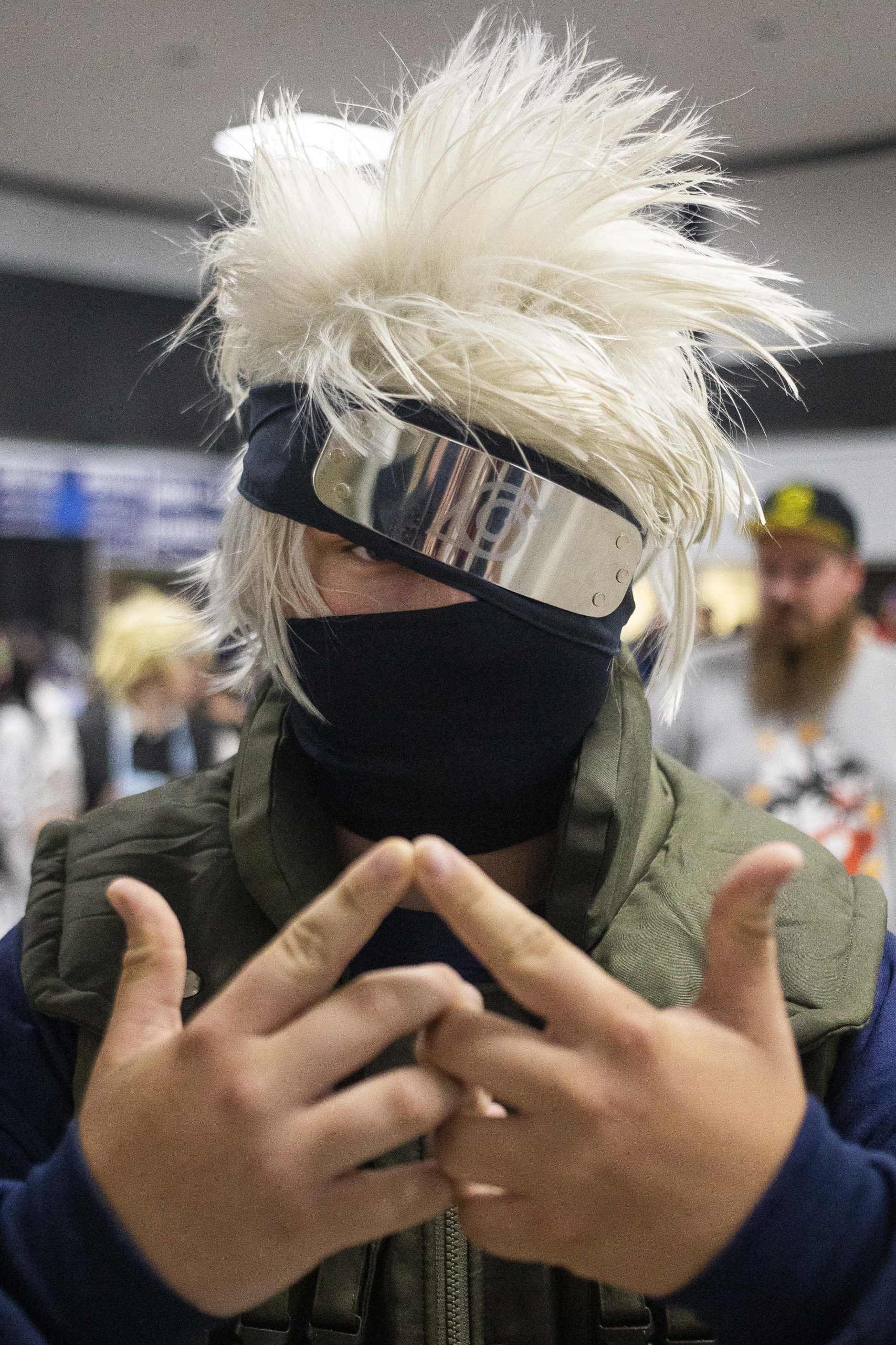 Ayden Gordon cosplays as Kakashi Hatake from “Naruto” during Really Cool Comic Con on Sunday, Aug. 6, 2023, at the Dort Financial Center in Flint.