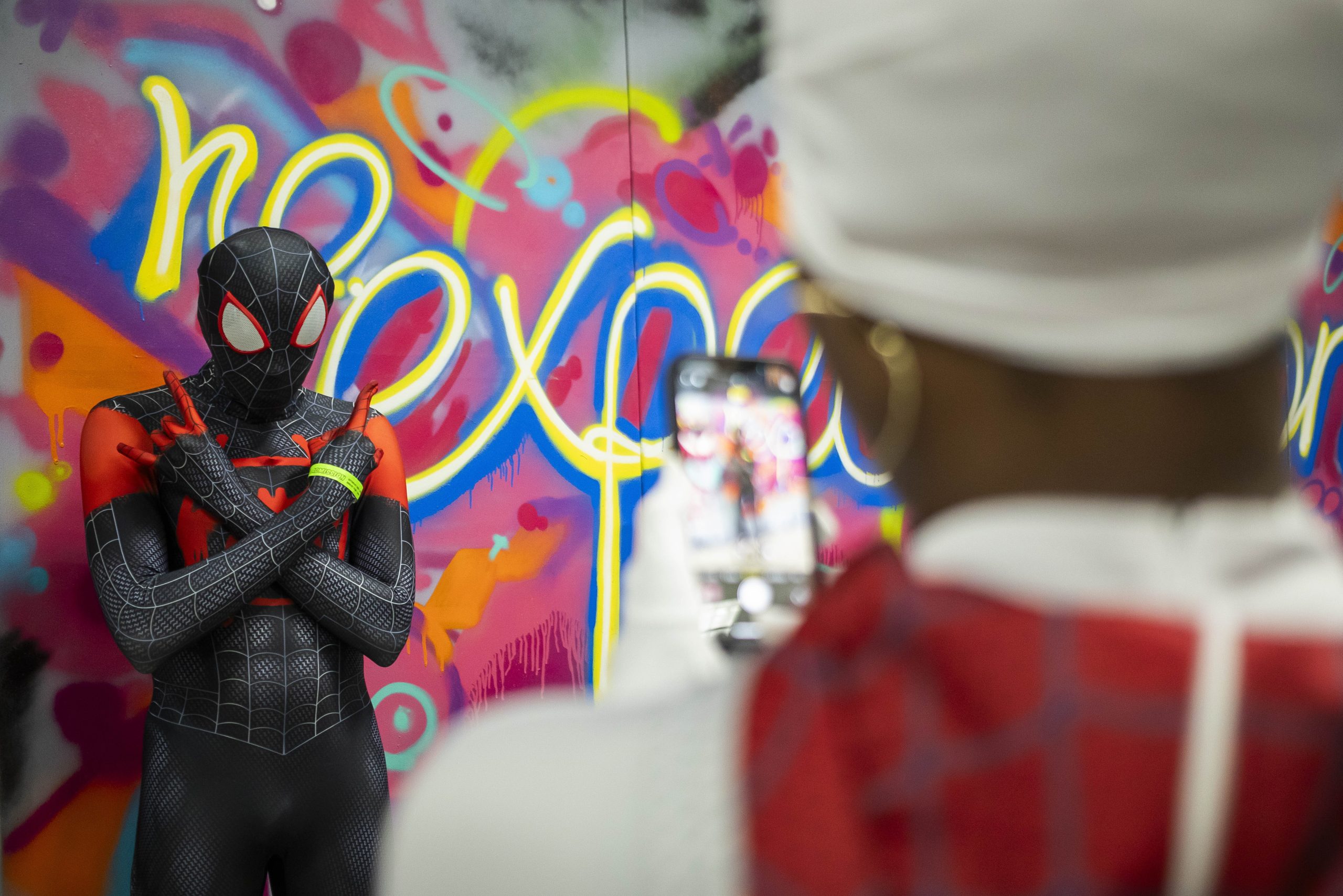 Austin Mosley cosplays as Miles Morales from “Spider-Man” during Really Cool Comic Con on Sunday, Aug. 6, 2023, at the Dort Financial Center in Flint.

