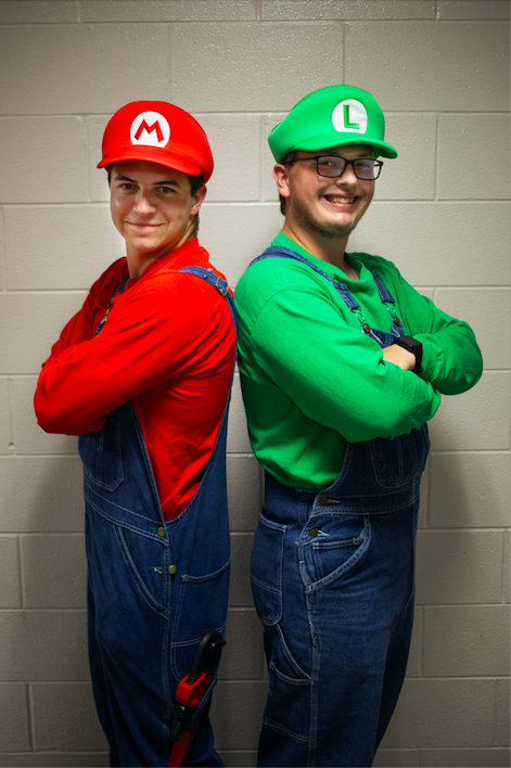 Nick Sherman, left, and Jeffrey Brownell, right, cosplay as Mario and Luigi from the “Super Mario” series during Really Cool Comic Con on Sunday, Aug. 6, 2023, at the Dort Financial Center in Flint.
