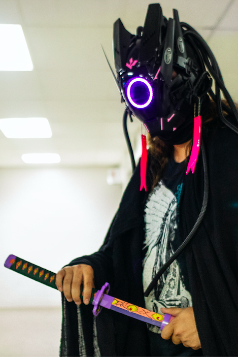 Dominik Hodgins cosplays as Wendigo Cyberpunk during Really Cool Comic Con on Sunday, Aug. 6, 2023, at the Dort Financial Center in Flint.
