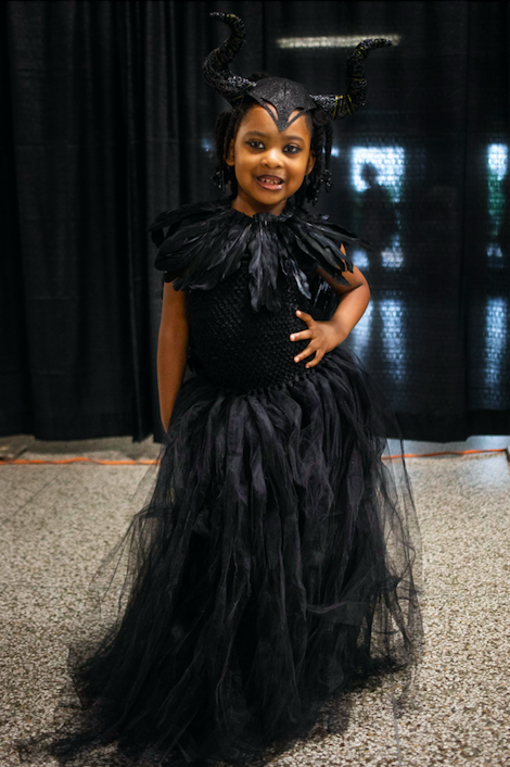 Jean Moore, 5, cosplays as Maleficent during Really Cool Comic Con on Sunday, Aug. 6, 2023, at the Dort Financial Center in Flint.