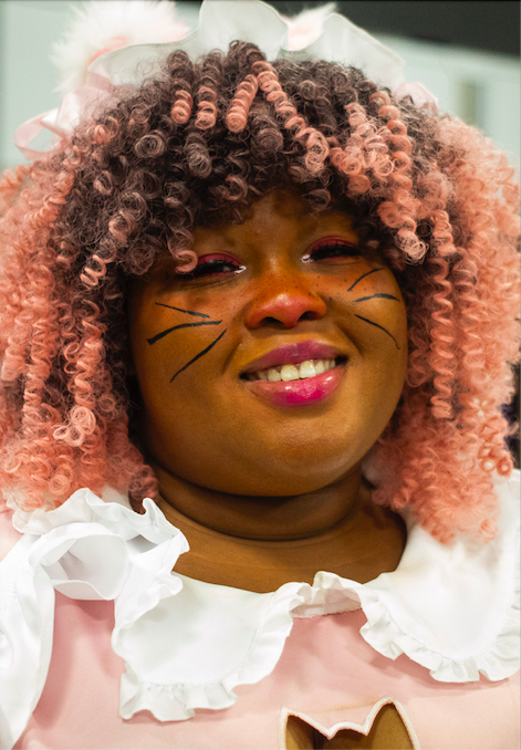 Kyla Cleveland cosplays as Hello Kitty during Really Cool Comic Con on Sunday, Aug. 6, 2023, at the Dort Financial Center in Flint.
