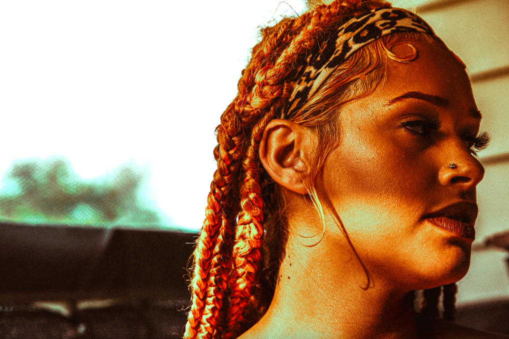 Taylor Tatum, pictured on her balcony on July 30, 2023. (Bryce Mata | Flintside)