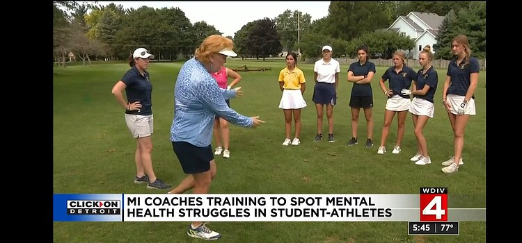 Coach Williams-Hoak and players.
