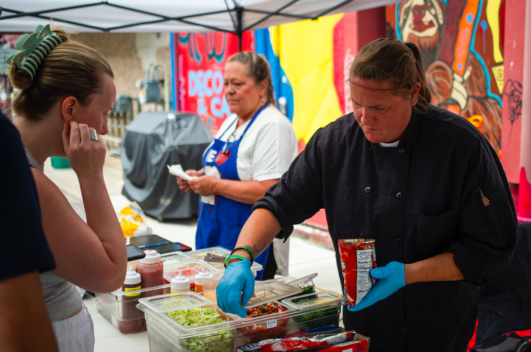 Hundreds of people gather in downtown Flint's Buckham Alley for Alley Fest on Saturday, July 8, 2023. (Katy Kildee | Flintside)