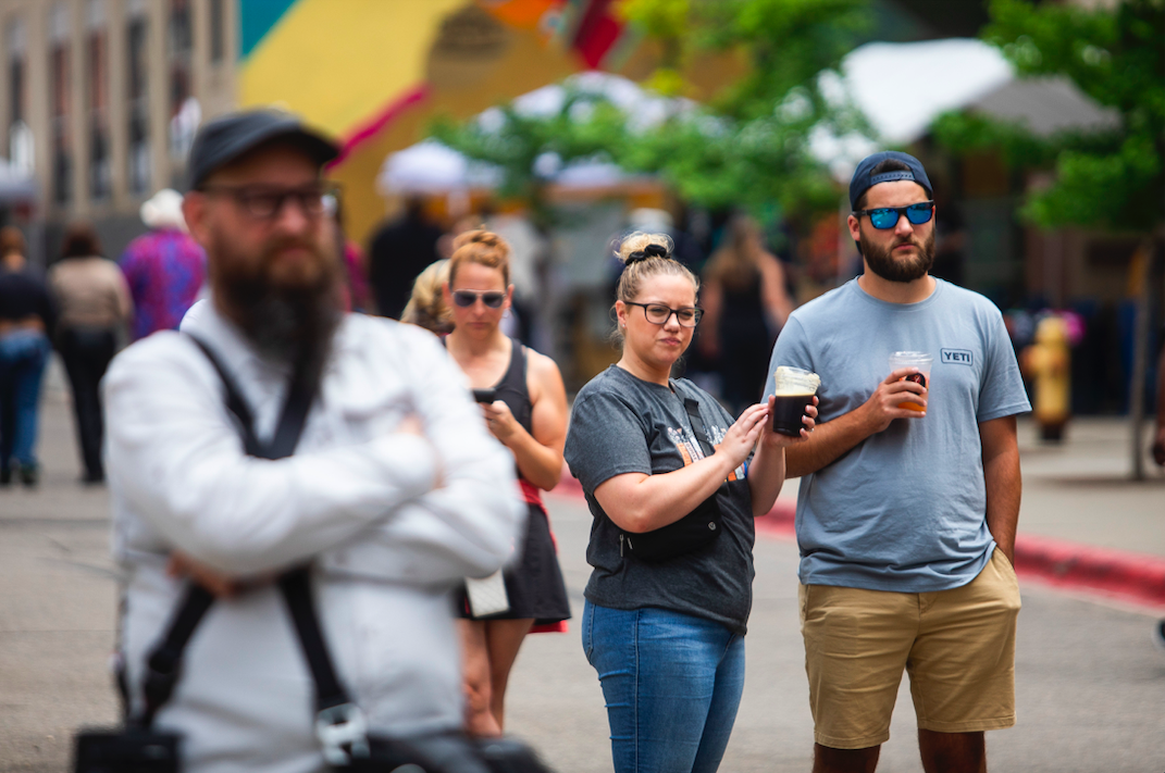 Hundreds of people gather in downtown Flint's Buckham Alley for Alley Fest on Saturday, July 8, 2023. (Katy Kildee | Flintside)