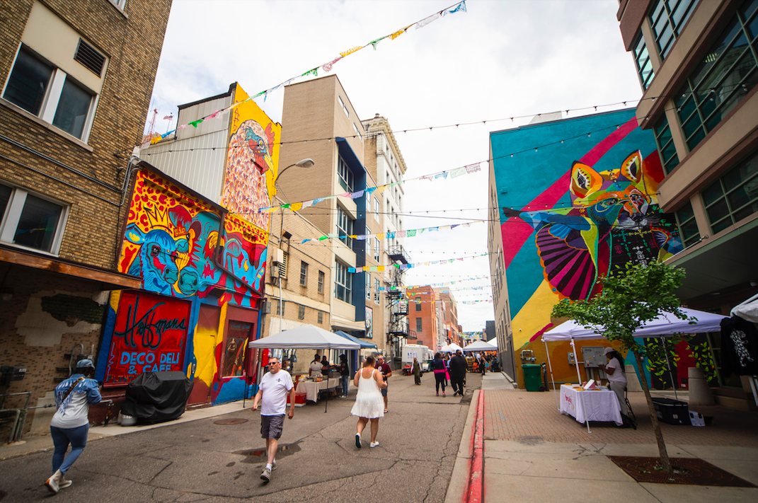 Hundreds of people gather in downtown Flint's Buckham Alley for Alley Fest on Saturday, July 8, 2023. (Katy Kildee | Flintside)