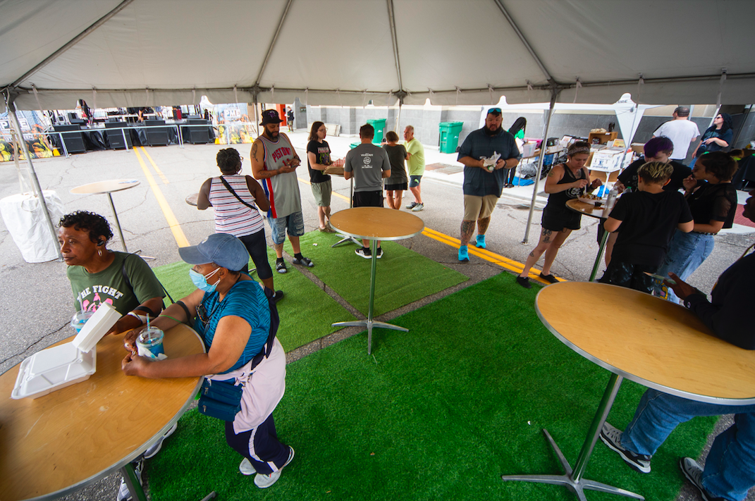 Hundreds of people gather in downtown Flint's Buckham Alley for Alley Fest on Saturday, July 8, 2023. (Katy Kildee | Flintside)