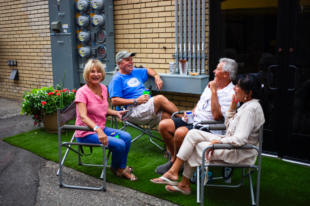 Hundreds of people gather in downtown Flint's Buckham Alley for Alley Fest on Saturday, July 8, 2023. (Katy Kildee | Flintside)
